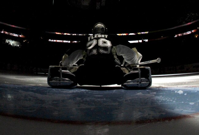 PITTSBURGH, PA - OCTOBER 20:  Marc-Andre Fleury #29 of the Pittsburgh Penguins stretches before the start of the game against the Montreal Canadiens at Consol Energy Center on October 20, 2011 in Pittsburgh, Pennsylvania.  (Photo by Justin K. Aller/Getty Images)