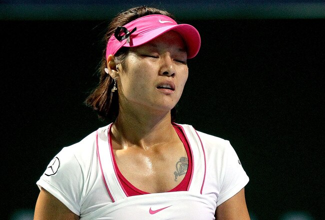 ISTANBUL, TURKEY - OCTOBER 27:  Li Na of China reacts to a lost point while playing Victoria Azarenka of Belarus during round robin play of the TEB BNP Paribas WTA Championships Istanbul at the Sinan Erdem Dome on October 27, 2011 in Istanbul, Turkey.  (Photo by Matthew Stockman/Getty Images)