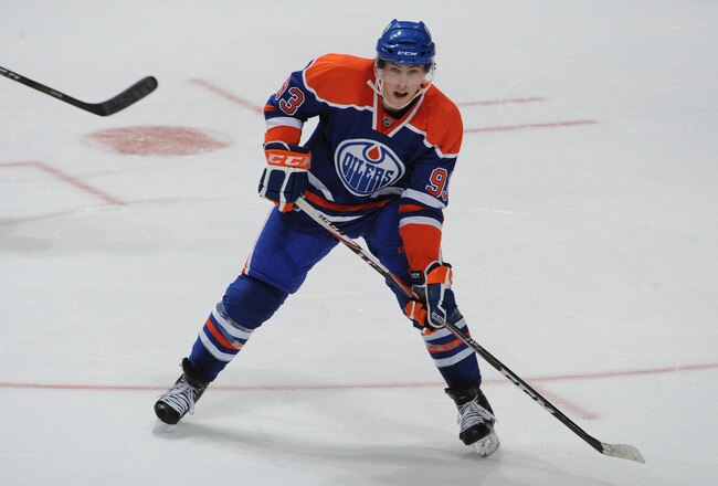 EDMONTON, CANADA - SEPTEMBER 22: Ryan Nugent-Hopkins #93 of the Edmonton Oilers skates against the Vancouver Canucks on September 22, 2011 at Rexall Place in Edmonton, Alberta, Canada. The Canucks won 2-1. (Photo by Dale MacMillan/Getty Images)
