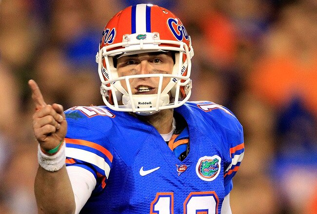 GAINESVILLE, FL - OCTOBER 01:  John Brantley #12 of the Florida Gators points during a game against the Alabama Crimson Tide at Ben Hill Griffin Stadium on October 1, 2011 in Gainesville, Florida.  (Photo by Sam Greenwood/Getty Images)