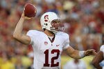 LOS ANGELES, CA - OCTOBER 29:  Quarterback Andrew Luck #12 of the Stanford Cardinal throws a pass against the USC Trojans at the Los Angeles Memorial Coliseum on October 29, 2011 in Los Angeles, California.  (Photo by Stephen Dunn/Getty Images)