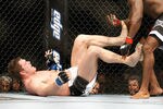 MONTREAL- MAY 8: Matt Mitrione kicks Kimbo Slice in their heavyweight bout at UFC 113 at Bell Centre on May 8, 2010 in Montreal, Quebec, Canada.  (Photo by Richard Wolowicz/Getty Images)