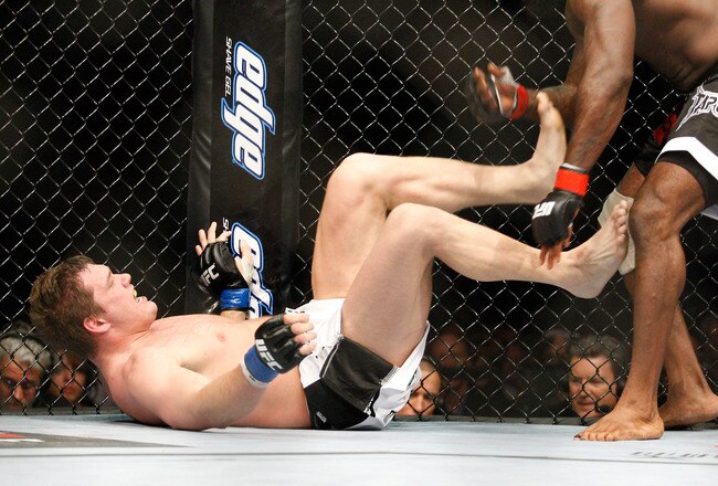 MONTREAL- MAY 8: Matt Mitrione kicks Kimbo Slice in their heavyweight bout at UFC 113 at Bell Centre on May 8, 2010 in Montreal, Quebec, Canada.  (Photo by Richard Wolowicz/Getty Images)