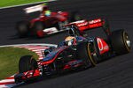 SUZUKA, JAPAN - OCTOBER 09:  Lewis Hamilton of Great Britain and McLaren leads from Felipe Massa of Brazil and Ferrari during the Japanese Formula One Grand Prix at Suzuka Circuit on October 9, 2011 in Suzuka, Japan.  (Photo by Mark Thompson/Getty Images)