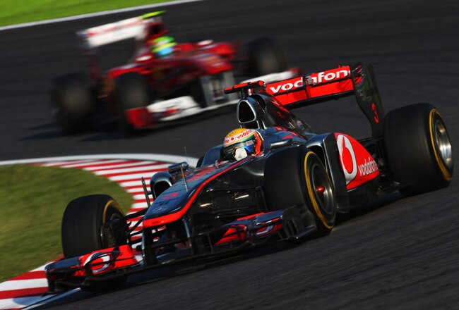 SUZUKA, JAPAN - OCTOBER 09:  Lewis Hamilton of Great Britain and McLaren leads from Felipe Massa of Brazil and Ferrari during the Japanese Formula One Grand Prix at Suzuka Circuit on October 9, 2011 in Suzuka, Japan.  (Photo by Mark Thompson/Getty Images)