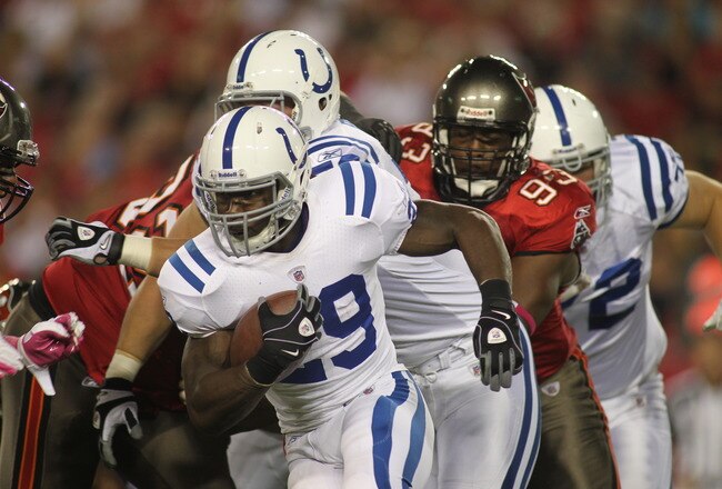 TAMPA, FL - OCTOBER 03: Running back Joseph Addai #29 of the Indianapolis Colts runs the ball against the Tampa Bay Buccaneers at Raymond James Stadium on October 3, 2011 in Tampa, Florida. (Photo by Marc Serota/Getty Images)