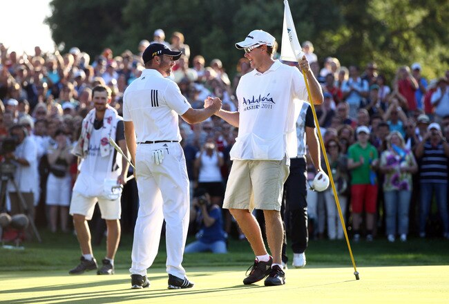 SOTOGRANDE, SPAIN - OCTOBER 30:  Sergio Garcia of Spain celebrates securing victory with his caddy Glen Murray during the final round of the Andalucia Masters at Valderrama on October 30, 2011 in Sotogrande, Spain.  (Photo by Richard Heathcote/Getty Images)