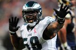 ST. LOUIS, MO - SEPTEMBER 11: Trent Cole #58 of the Philadelphia Eagles celebrates after recording a sack against the St. Louis Rams at the Edward Jones Dome on September 11, 2011 in St. Louis, Missouri. The Eagles defeated the Rams 31-15. (Photo by Jeff Curry/Getty Images)