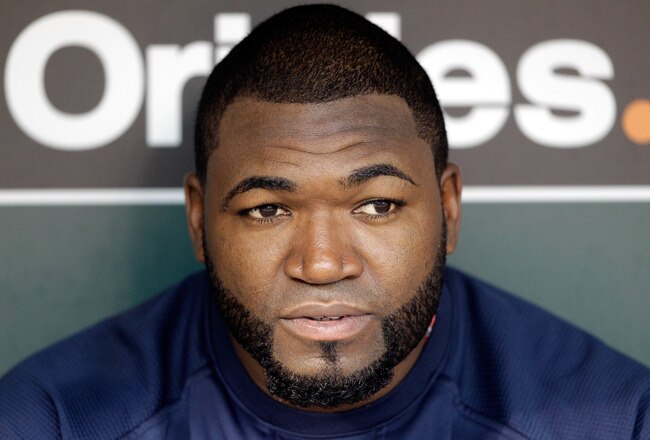 BALTIMORE, MD - SEPTEMBER 27:  David Ortiz #34 of the Boston Red Sox talks with the media before the start of the Red Sox game against the Baltimore Orioles at Oriole Park at Camden Yards on September 27, 2011 in Baltimore, Maryland.  (Photo by Rob Carr/Getty Images)