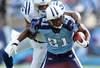 NASHVILLE, TN - OCTOBER 30:  Javon Ringer #21 of the Tennessee Titans runs with the ball while defended by Joe Lefeged #35 of the Indianapolis Colts during the NFL game at LP Field on October 30, 2011 in Nashville, Tennessee.  (Photo by Andy Lyons/Getty Images)