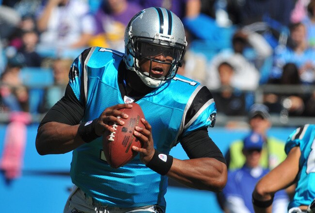 CHARLOTTE, NC - OCTOBER 30:  Quarterback Cam Newton #1 of  the Carolina Panthers sets to pass against the Minnesota Vikings October 30, 2011 at Bank of America Stadium in Charlotte, North Carolina.  (Photo by Al Messerschmidt/Getty Images)