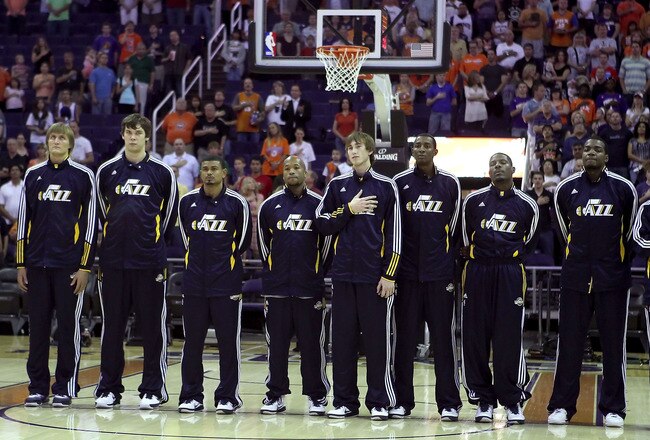 PHOENIX - OCTOBER 12:  The Utah Jazz stand attended for the National Anthem before the preseason NBA game against the Phoenix Suns at US Airways Center on October 12, 2010 in Phoenix, Arizona. NOTE TO USER: User expressly acknowledges and agrees that, by downloading and or using this photograph, User is consenting to the terms and conditions of the Getty Images License Agreement.  (Photo by Christian Petersen/Getty Images)