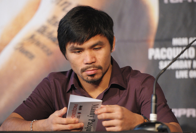 NEW YORK, NY - SEPTEMBER 06:  Professional Boxer Manny 
Pacquiao (pictured) attends the press conference for his World 
Welterweight Championship Fight with Juan Manuel Marquez at The 
Lighthouse at Chelsea Piers on September 6, 2011 in New York City.  
(Photo by Michael Loccisano/Getty Images)