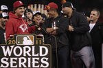 ST. LOUIS, MO - OCTOBER 30: Manager Tony La Russa (L-R) jokes with Octavio Dotel and Albert Pujols of the St. Louis Cardinals during a ceremony celebrating the team's 11th World Series championship October 30, 2011 in St. Louis, Missouri. (Photo by Whitney Curtis/Getty Images)