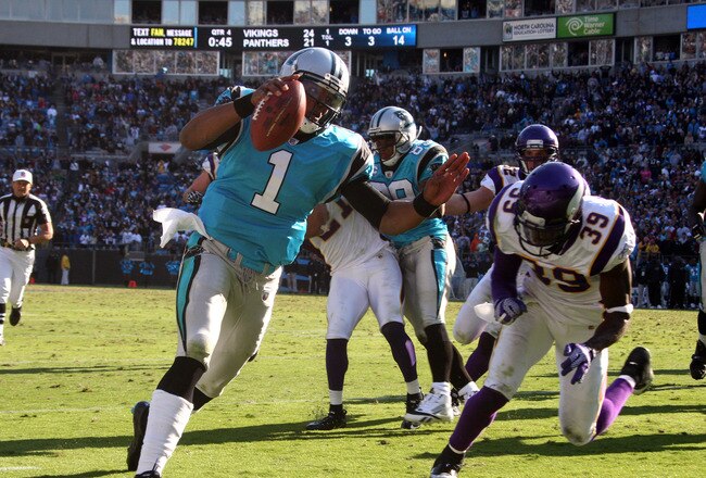 CHARLOTTE, NC - OCTOBER 30: Cam Newton #1 of the Carolina Panthers carries the ball against the Minnesota Vikings at Bank of America Stadium on October 30, 2011 in Charlotte, North Carolina. (Photo by Scott Cunningham/Getty Images)