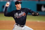 MIAMI GARDENS, FL - SEPTEMBER 21:  Pitcher Gerek Lowe #32 of the Atlanta Braves throws against thes Florida Marlins at Sun Life Stadium on September 21, 2011 in Miami Gardens, Florida.  (Photo by Marc Serota/Getty Images)