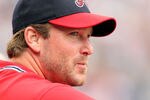 ATLANTA - SEPTEMBER 4: Derek Lowe #32 of the Atlanta Braves watches the action from the dugout against the Los Angeles Dodgers on September 4, 2011 at Turner Field in Atlanta, Georgia. The Braves beat the Dodgers 4-3. (Photo by Joe Murphy/Getty Images)