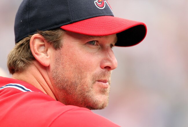 ATLANTA - SEPTEMBER 4: Derek Lowe #32 of the Atlanta Braves watches the action from the dugout against the Los Angeles Dodgers on September 4, 2011 at Turner Field in Atlanta, Georgia. The Braves beat the Dodgers 4-3. (Photo by Joe Murphy/Getty Images)