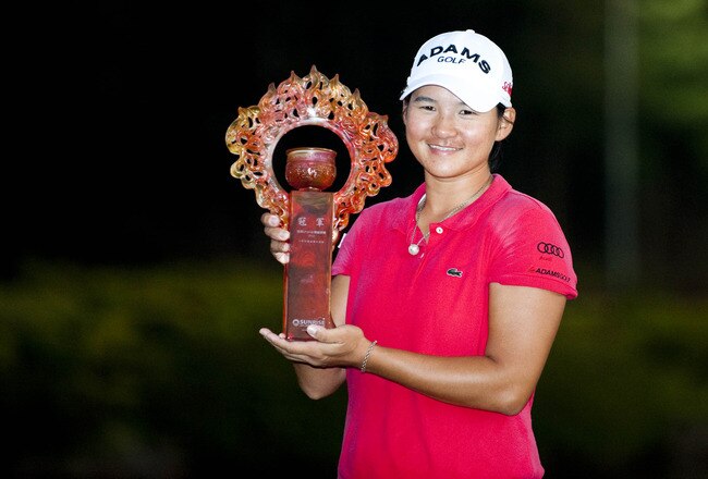 TAOYUAN, TAIWAN - OCTOBER 23: Yani Tseng poses with the trophy after winning the Sunrise LPGA Taiwan Championship at Sunrise Golf Course on October 23, 2011 in Taoyuan, Taiwan. (Photo by Victor Fraile/Getty Images)
