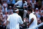 2 Jul 2001:  Pete Sampras of the USA congratulates Roger Federer of Switzerland following his victory during the men's fourth round of The All England Lawn Tennis Championship at Wimbledon, London.  Mandatory Credit: Clive Brunskill/ALLSPORT