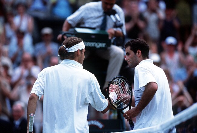 2 Jul 2001:  Pete Sampras of the USA congratulates Roger Federer of Switzerland following his victory during the men's fourth round of The All England Lawn Tennis Championship at Wimbledon, London.  Mandatory Credit: Clive Brunskill/ALLSPORT