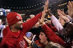 ST LOUIS, MO - OCTOBER 28: Albert Pujols #5 of the St. Louis Cardinals celebrates with fans after defeating the Texas Rangers 6-2 to win the World Series in Game Seven of the MLB World Series at Busch Stadium on October 28, 2011 in St Louis, Missouri.  (Photo by Ezra Shaw/Getty Images)