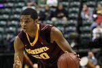 INDIANAPOLIS, IN - MARCH 10:  Ralph Sampson III #50 of the Minnesota Golden Gophers drives against the Northwestern Wildcats during the first round of the 2011 Big Ten Men's Basketball Tournament at Conseco Fieldhouse on March 10, 2011 in Indianapolis, Indiana. Northwestern won 75-65. (Photo by Andy Lyons/Getty Images)