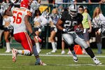 OAKLAND, CA - OCTOBER 23: Running back Michael Bush #29 of the Oakland Raiders looks for an opening against the Kansas City Chiefs on October 23, 2011 at O.co Coliseum in Oakland, California. The Chiefs won 28-0. (Photo by Brian Bahr/Getty Images)