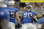 DETROIT - NOVEMBER 25:  Ndamukong Suh #90 of the Detroit Lions celebrates a first quarter sack next to Kyle Vanden Bosch #93 while playing the New England Patriots on November 25, 2010 at Ford Field in Detroit, Michigan.  (Photo by Gregory Shamus/Getty Images)