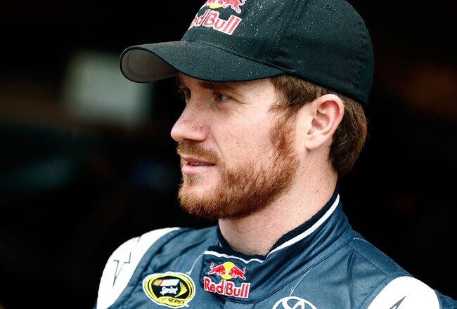 MARTINSVILLE, VA - OCTOBER 28:  Brian Vickers, driver of the #83 Red Bull Toyota, stands in the garage area during practice for the NASCAR Sprint Cup Series TUMS Fast Relief 500 at Martinsville Speedway on October 28, 2011 in Martinsville, Virginia.  (Photo by Jeff Zelevansky/Getty Images for NASCAR)