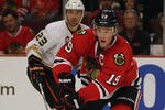 CHICAGO, IL - OCTOBER 25:  Jonathan Toews #19 of the Chicago Blackhawks controls the puck against the Anaheim Ducks at the United Center on October 25, 2011 in Chicago, Illinois. The Blackhawks defeated the Ducks 3-2 in a shootout.  (Photo by Jonathan Daniel/Getty Images)