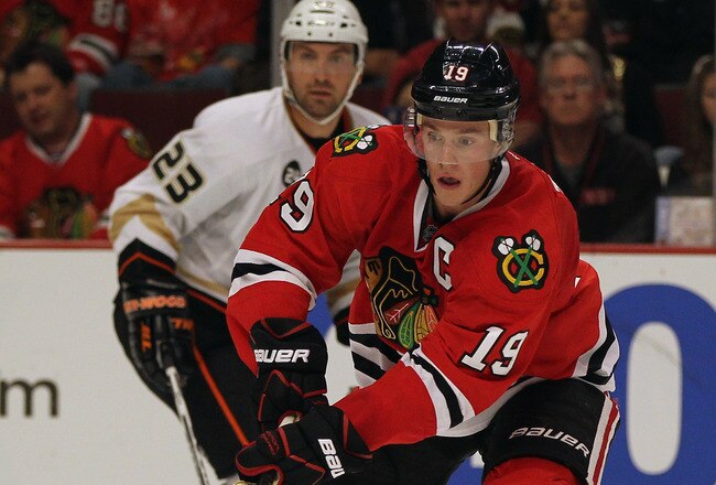 CHICAGO, IL - OCTOBER 25:  Jonathan Toews #19 of the Chicago Blackhawks controls the puck against the Anaheim Ducks at the United Center on October 25, 2011 in Chicago, Illinois. The Blackhawks defeated the Ducks 3-2 in a shootout.  (Photo by Jonathan Daniel/Getty Images)