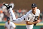 DETROIT, MI - OCTOBER 13:  Justin Verlander #35 of the Detroit Tigers throws a pitch against the Detroit Tigers in the first inning of Game Five of the American League Championship Series at Comerica Park on October 13, 2011 in Detroit, Michigan.  (Photo by Leon Halip/Getty Images)