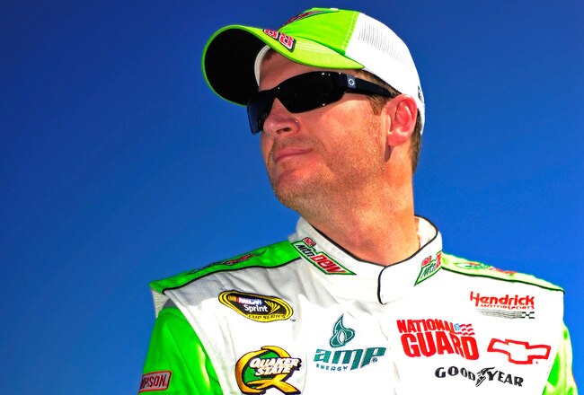 TALLADEGA, AL - OCTOBER 22:  Dale Earnhardt Jr., driver of the #88 Diet Mountain Dew Chevrolet, stands on the grid after qualifying for the NASCAR Sprint Cup Series Good Sam Club 500 at Talladega Superspeedway on October 22, 2011 in Talladega, Alabama.  (Photo by Jason Smith/Getty Images)