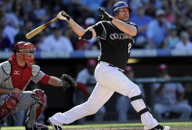 DENVER, CO - SEPTEMBER 10: Jason Giambi #23 of the Colorado Rockies hits against the Cincinnati Reds  at Coors Field on September 10, 2011 in Denver, Colorado. Colorado beat Cincinnati 12-7.  (Photo by Jack Dempsey/Getty Images)