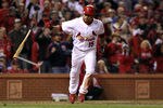 ST LOUIS, MO - OCTOBER 28:  Rafael Furcal #15 of the St. Louis Cardinals is hit by a pitch with the bases loaded to score Albert Pujols #5 in the fifth inning during Game Seven of the MLB World Series against the Texas Rangers at Busch Stadium on October 28, 2011 in St Louis, Missouri.  (Photo by Jamie Squire/Getty Images)