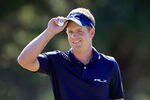 LAKE BUENA VISTA, FL - OCTOBER 23:  Luke Donald of England acknowledges the crowd after making a birdie putt on the 13th hole during the final round of the Children's Miracle Network Classic at Disney's Magnolia course on October 23, 2011 in Lake Buena Vista, Florida.  (Photo by Sam Greenwood/Getty Images)