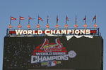 ST. LOUIS - APRIL 1:  A sign denoting the St. Louis Cardinals 2006 World Championship is unveiled before their Opening Day game against the New York Mets on April 1, 2007 at Busch Stadium in St. Louis, Missouri.  The Mets beat the Cards 6-1.  (Photo by Dilip Vishwanat/Getty Images)