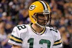 MINNEAPOLIS, MN - OCTOBER 23: Aaron Rodgers #12 of the Green Bay Packers reacts during the second half against the Minnesota Vikings on October 23, 2011 at Hubert H. Humphrey Metrodome in Minneapolis, Minnesota. The Packers defeated the Vikings 33-27. (Photo by Hannah Foslien/Getty Images)