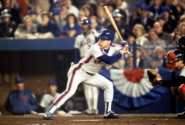 FLUSHING, NY - OCTOBER 27:  Outfielder Lenny Dykstra #4 of the New York Mets at bat during game 7 of the 1986 World Series against the Boston Red Sox at Shea Stadium on October 27, 1986 in Flushing, New York. The Mets won the series 4-3.  (Photo by T.G. Higgins/Getty Images)