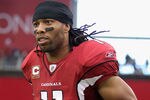 GLENDALE, AZ - OCTOBER 23:  Wide receiver Larry Fitzgerald #11 of the Arizona Cardinals runs out onto the field before the NFL game against the Pittsburgh Steelers at the University of Phoenix Stadium on October 23, 2011 in Glendale, Arizona. The Steelers defeated the Cardinals 32-20.  (Photo by Christian Petersen/Getty Images)