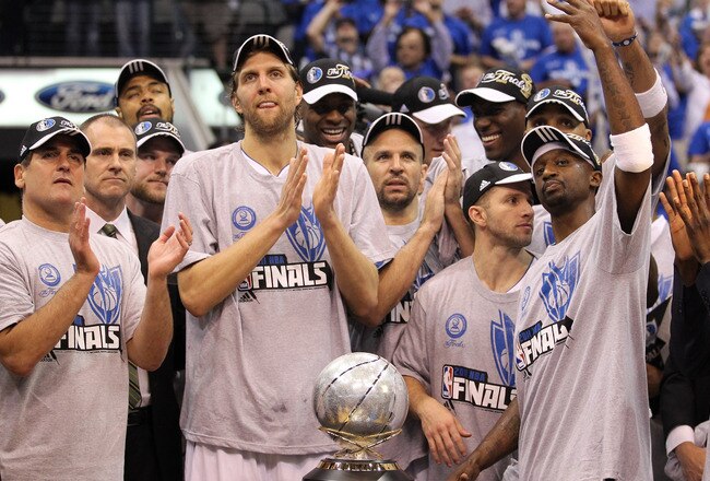 DALLAS, TX - MAY 25:  The Dallas Mavericks celebrate their 100-96 victory against the Oklahoma City Thunder in Game Five of the Western Conference Finals during the 2011 NBA Playoffs at American Airlines Center on May 25, 2011 in Dallas, Texas. NOTE TO USER: User expressly acknowledges and agrees that, by downloading and or using this photograph, User is consenting to the terms and conditions of the Getty Images License Agreement.  (Photo by Ronald Martinez/Getty Images)