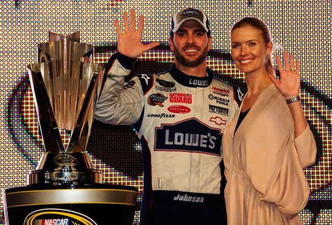 HOMESTEAD, FL - NOVEMBER 21:  Jimmie Johnson (L), driver of the #48 Lowe's Chevrolet, poses with his wife Chandra after finishing in second place in the Ford 400 to clinch his fifth consecutive NASCAR Sprint Cup championship at Homestead-Miami Speedway on November 21, 2010 in Homestead, Florida.  (Photo by Rusty Jarrett/Getty Images for NASCAR)