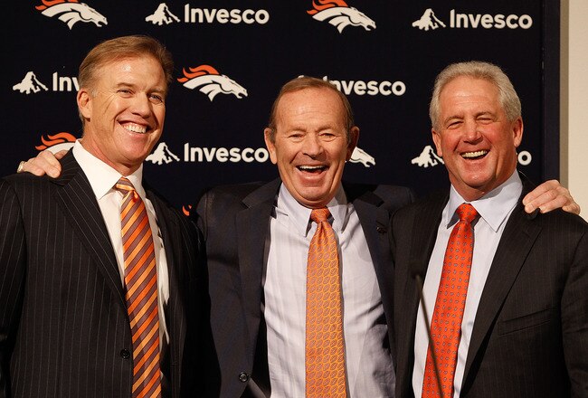 ENGLEWOOD, CO - JANUARY 14:  Denver Broncos vice president of football operations John Elway (L), owner Pat Bowlen and new head coach John Fox share a laugh before Fox addressed the media at Dove Valley on January 14, 2011 in Englewood, Colorado. Fox was named the 14th head coach in Broncos history yesterday after spending the last nine seasons as head coach of the Carolina Panthers. (Photo by Justin Edmonds/Getty Images)