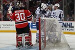 NEWARK, NJ - NOVEMBER 02: The Toronto Maple Leafs celebrate a score by Joey Crabb #46 at 8:37 of the first period against Martin Brodeur #30 of the New Jersey Devils at the Prudential Center on November 2, 2011 in Newark, New Jersey. (Photo by Bruce Bennett/Getty Images)