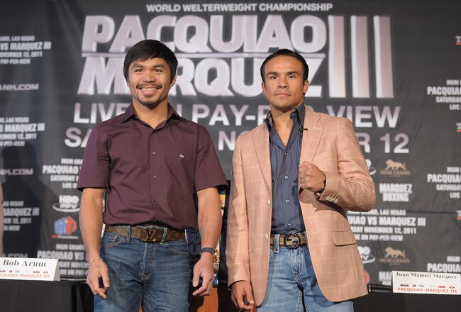 NEW YORK, NY - SEPTEMBER 06:  Professional Boxers Manny Pacquiao (L) and Juan Manuel Marquez attend the press conference for their World Welterweight Championship Fight at The Lighthouse at Chelsea Piers on September 6, 2011 in New York City.  (Photo by Michael Loccisano/Getty Images)