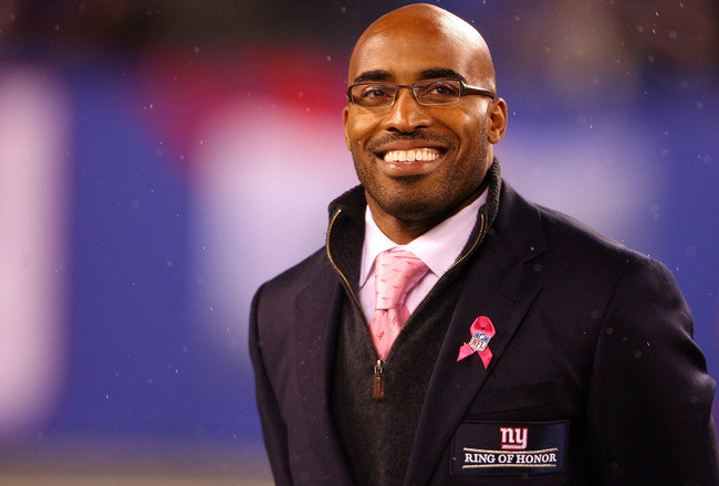 EAST RUTHERFORD, NJ - OCTOBER 03:  Former New York Giants Tiki Barber is inducted into the Giants �Ring of Honor� during halftime of a game between the Chicago Bears and the New York Giants at New Meadowlands Stadium on October 3, 2010 in East Rutherford, New Jersey.  (Photo by Andrew Burton/Getty Images)