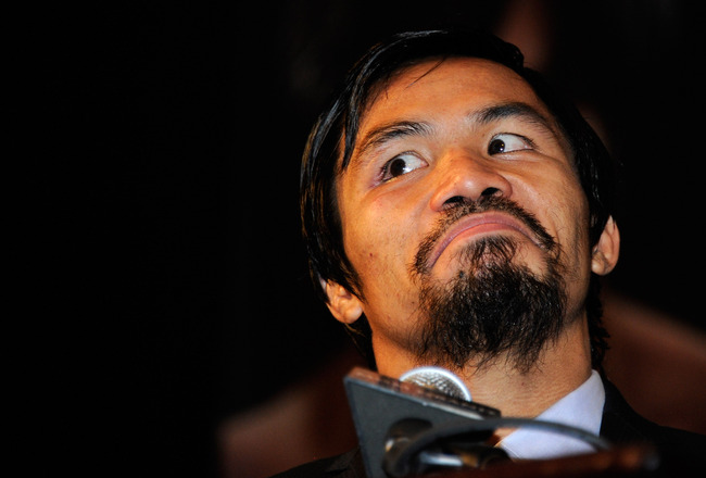conference after Pacquiao defeated Shane Mosley by unanimous decision ...