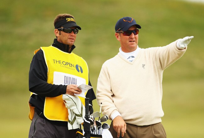 SANDWICH, ENGLAND - JULY 14:   David Duval of the United States lines up a shot with his caddy during the first round of The 140th Open Championship at Royal St George's on July 14, 2011 in Sandwich, England. (Photo by Scott Halleran/Getty Images)