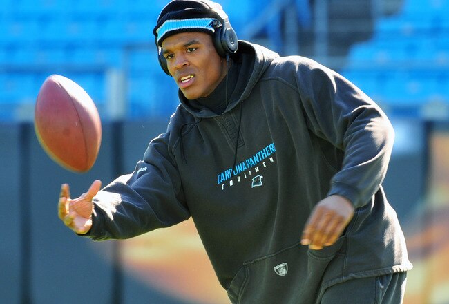 CHARLOTTE, NC - OCTOBER 30:  Quarterback Cam Newton #1 of  the Carolina Panthers warms up for play against the Minnesota Vikings October 30, 2011 at Bank of America Stadium in Charlotte, North Carolina.  (Photo by Al Messerschmidt/Getty Images)